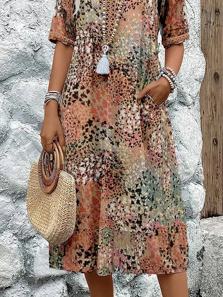 SUSAN | ABITO MIDI DALLA TONALITÀ VIVACE CON ELEGANTE COPERTURA DEL VENTRE