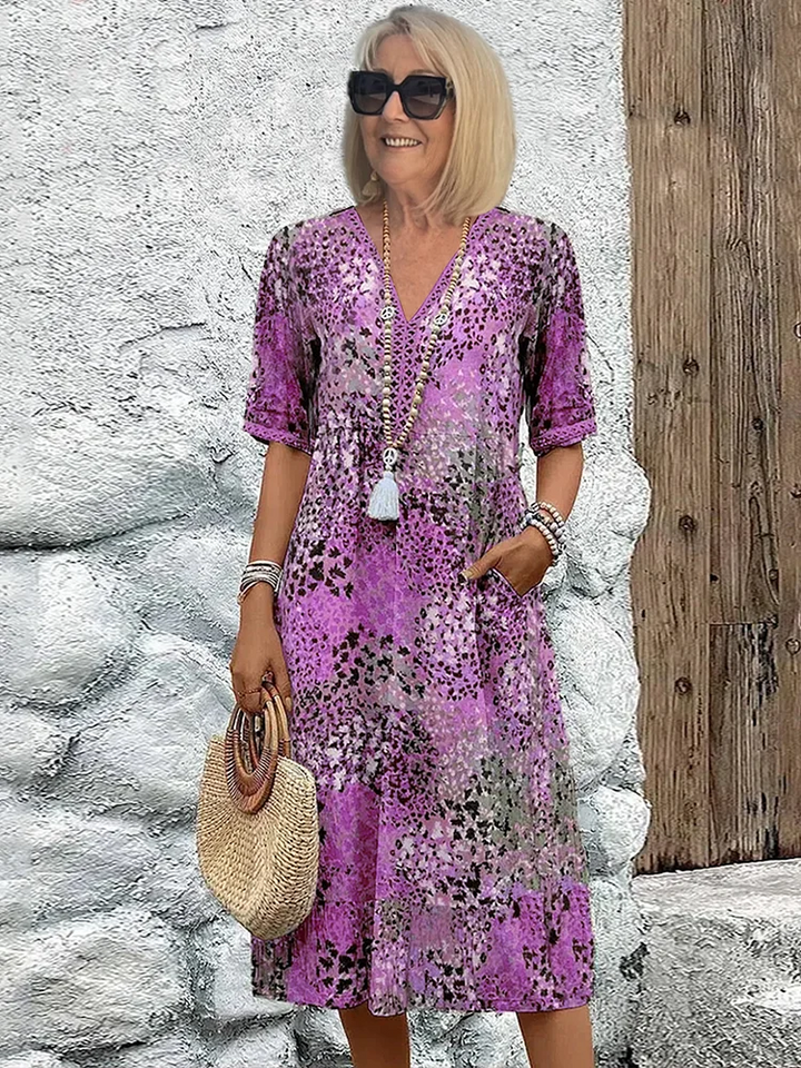 SUSAN | ABITO MIDI DALLA TONALITÀ VIVACE CON ELEGANTE COPERTURA DEL VENTRE